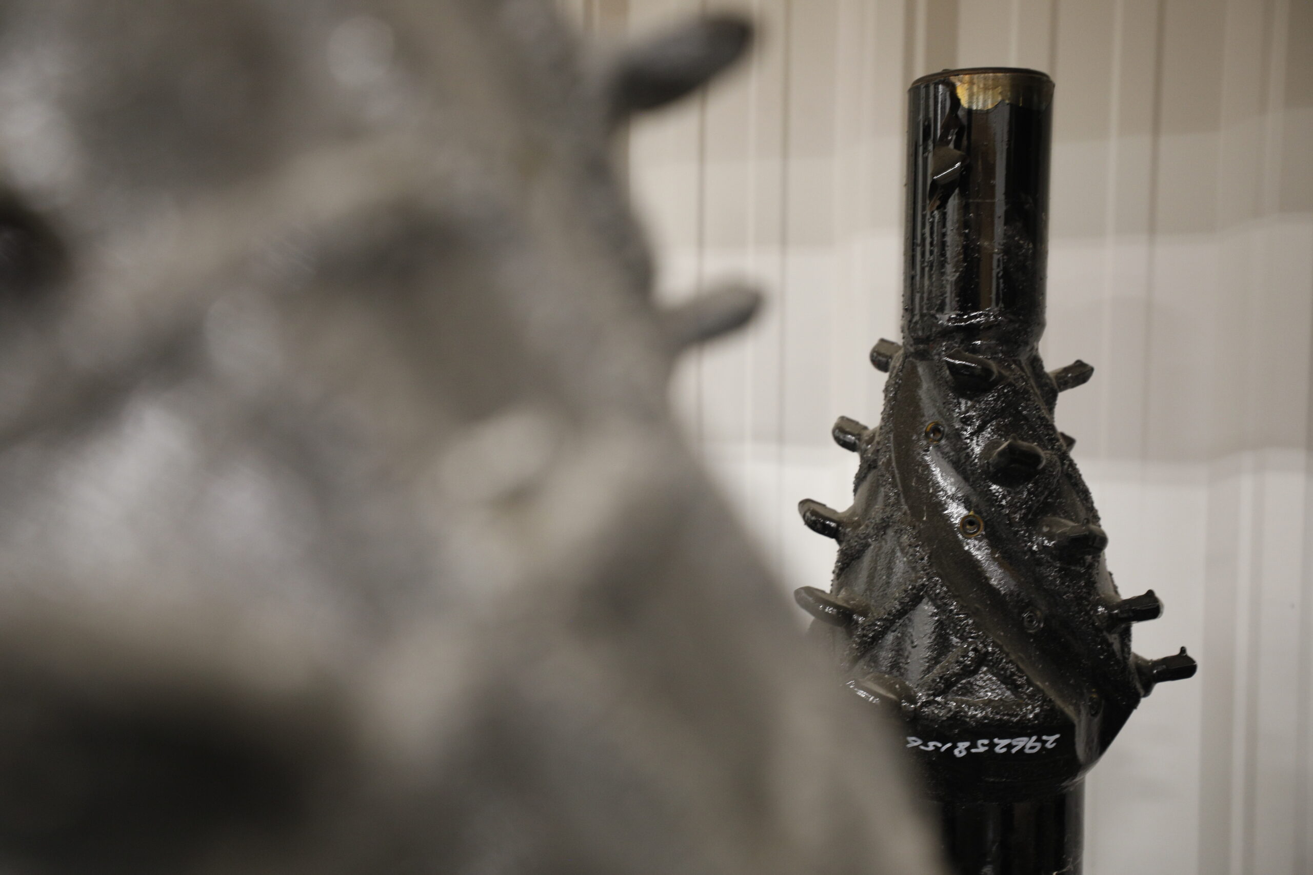 Drill bit in parts storage area